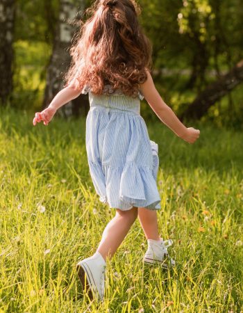 rear-view-girl-running-park